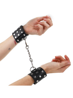 MUÑEQUERAS BDSM CON TACHUELAS AJUSTABLES KINK NEGRO DE LA MARCA KINK WRIST RESTRAINT